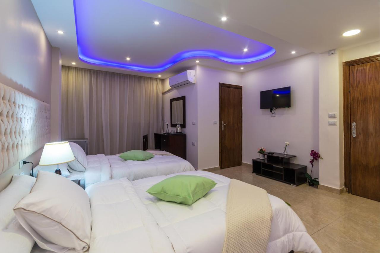 Amon Holiday Pyramids Inn Kafrat al Jabal ภายนอก รูปภาพ