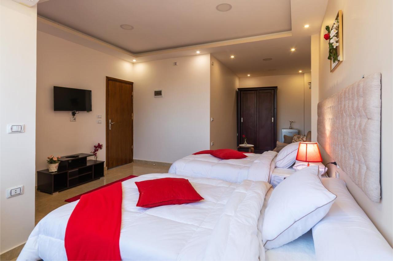 Amon Holiday Pyramids Inn Kafrat al Jabal ภายนอก รูปภาพ