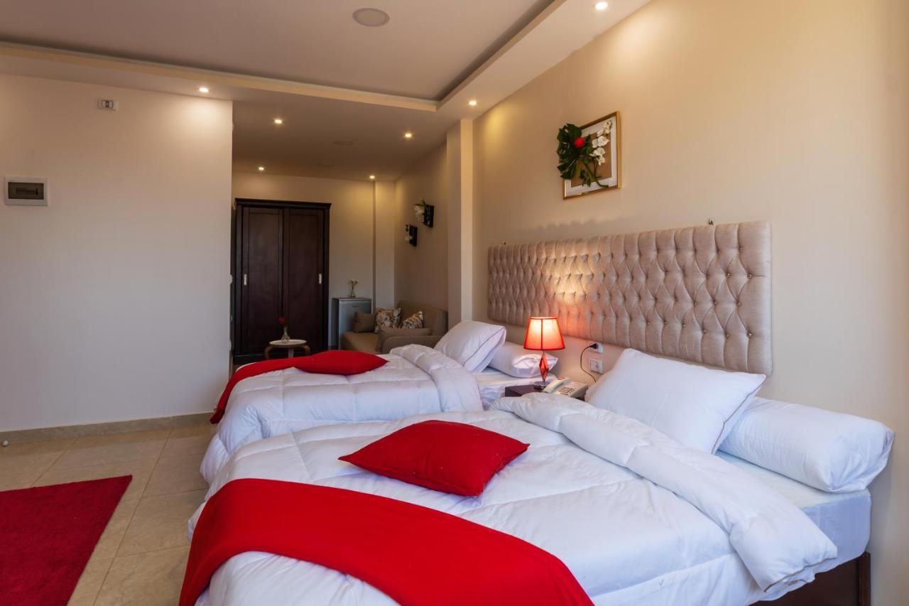 Amon Holiday Pyramids Inn Kafrat al Jabal ภายนอก รูปภาพ